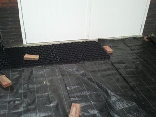 grind aanleggen grindplaten en worteldoek